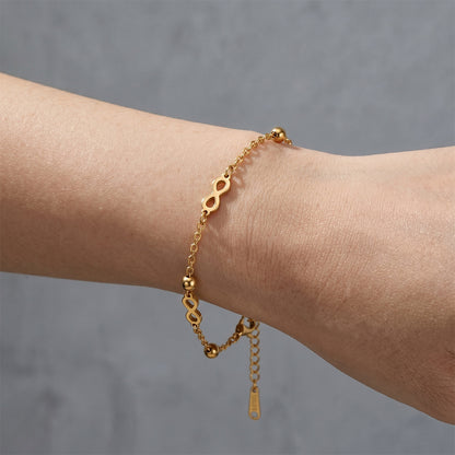 Bracelet Infini · Perles Dorées