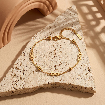 Bracelet Infini · Perles Dorées