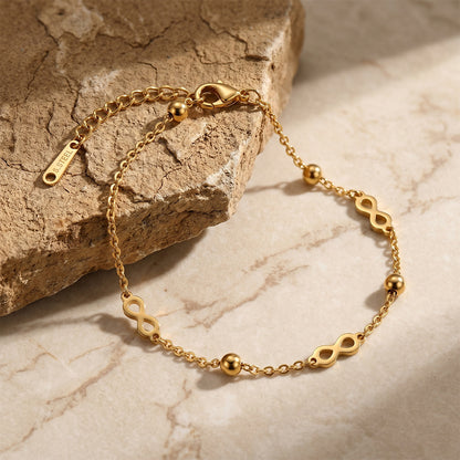 Bracelet Infini · Perles Dorées